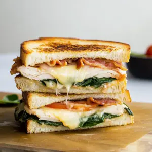 Turkey Melt with Cheddar, Spinach, and Bacon